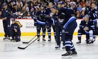 Patrik Laine follows through on a shot during the accuracy event at the Winnipeg Jets skills competition at Bell MTS Place in Winnipeg on Wed., Feb. 14, 2018. Kevin King/Winnipeg Sun/Postmedia Network