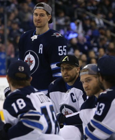 Mark Scheifele (top) and Blake Wheeler (centre) listen to teammates during the Winnipeg Jets skills competition at Bell MTS Place in Winnipeg on Wed., Feb. 14, 2018. Kevin King/Winnipeg Sun/Postmedia Network