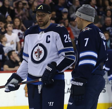 Blake Wheeler (left) and Ben Chiarot chat during the Winnipeg Jets skills competition at Bell MTS Place in Winnipeg on Wed., Feb. 14, 2018. Kevin King/Winnipeg Sun/Postmedia Network