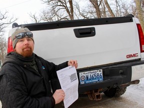 Robert Wiens holds the photo radar ticket for his truck. The only problem is it wasn't his truck, and he wants to know why he was sent the ticket and now has to deal with the aftermath. Scott Billeck/Winnipeg Sun