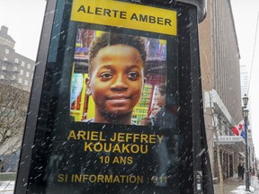MONTREAL, QUE.: MARCH 13, 2018 -- Electronic billboard on Mountain St in Montreal displays amber alert for missing ten year old Ariel Jeffrey Kouakou Tuesday March 13, 2018.  The young boy went missing on Monday. (John Mahoney / MONTREAL GAZETTE) ORG XMIT: 60340 - 0230