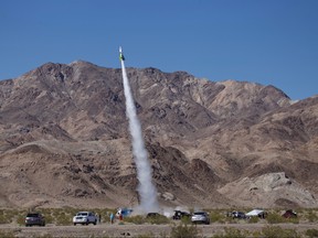 "Mad" Mike Hughes' home-made rocket launches near Amboy, Calif., on Saturday, March 24, 2018. The self-taught rocket scientist who believes the Earth is flat propelled himself about 1,875 feet into the air before a hard-landing in the Mojave Desert that left him injured. (Matt Hartman via AP) ORG XMIT: CAMH101