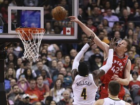 Toronto Raptors centre Jakob Poeltl throws down two of his 12 points against the Nuggets on Tuesday night. (JACK BOLAND/Toronto Sun)