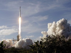 A Canadian company has been chosen by Elon Musk's SpaceX to provide special creepers designed to help workers to inspect its Falcon 9 rockets. A Falcon 9 SpaceX heavy rocket lifts off from pad 39A at the Kennedy Space Center in Cape Canaveral, Fla., Tuesday, Feb. 6, 2018. The Falcon Heavy has three first-stage boosters, strapped together with 27 engines in all. THE CANADIAN PRESS/AP-Terry Renna ORG XMIT: CPT102