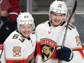 Florida Panthers centre Aleksander Barkov celebrates with teammate Evgenii Dadonov after scoring against the Montreal Canadiens on March 19, 2018