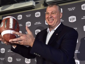 Randy Ambrosie gave himself the old pat on the back on Thursday. THE CANADIAN PRESS/Frank Gunn ORG XMIT: CPT127