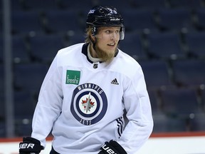 Patrik Laine of the Jets and Washington's Alex Ovechkin sit at 40 goals and each player has 14 games left in the regular season, including Monday’s second and final meeting between the two clubs.