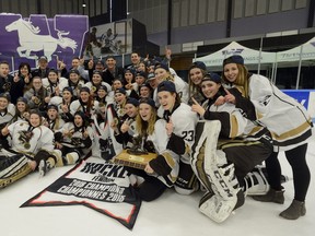 Manitoba Bisons  celebrate after winning the Women's Hockey National Championship 2-0 over Western at Western University's Thompson Arena on Sunday March 18, 2018. MORRIS LAMONT/THE LONDON FREE PRESS /POSTMEDIA NETWORK