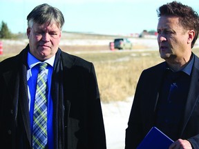 Portage MLA and Minister of Education and Training, Ian Wishart (left) and Infrastructure Minister Ron Schuler (right) announced the replacement of the Hwy 1A bypass in Portage la Prairie Thursday afternoon.