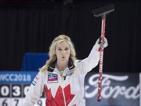 Canada skip Jennifer Jones celebrates her team's victory over Russia at the World Women's Curling Championship Thursday, March 22, 2018 in North Bay, Ont.