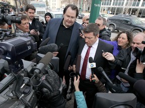 Former NHL player Sheldon Kennedy (right) and Greg Gilhooly leave the Law Courts in Winnipeg on Tues., March 20, 2012 after sentencing for Graham James. Both were victims of James.
WINNIPEG SUN FILES
