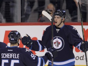 Jets checking centre Adam Lowry will be among those tasked with containing the Kings Jeff Carter.