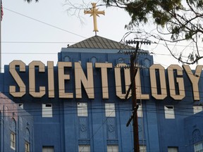 This Aug. 25, 2016, photo shows the Scientology Cross perched atop the Church of Scientology in Los Angeles. Scientology is about to get its own television channel starting Monday, March 11, 2018. A Twitter handle, website and app for Scientology TV appeared Sunday posting updates to hype the network's availability on DIRECTV, AppleTV, Roku, fireTV, Chromecast, iTunes and Google Play. (AP Photo/Richard Vogel)