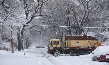 Garbage crew working in the Crescentwood area of Winnipeg on Mon., March 5, 2018. Kevin King/Winnipeg Sun/Postmedia Network