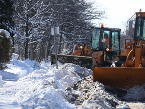 Snow-clearing equipment at work on St. Vital Road on Tuesday.