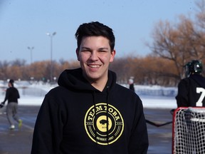 Event chair and spokesman Peirce Dickson poses during the Fivehole for Five Days street hockey tournament in a parking lot on the University of Manitoba's Fort Garry Campus in Winnipeg on Sunday. The event is one of a number taking place in support of the 5 Days for the Homeless campaign, which is raising funds for Resource Assistance for Youth (RaY).