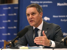 Finance Minister Cameron Friesen speaks to Budget 2018 during a press conference at the Manitoba Legislative Building in Winnipeg on Mon., March 12, 2018. Kevin King/Winnipeg Sun/Postmedia Network