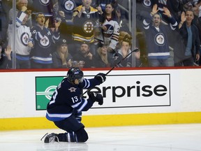 Winnipeg Jets forward Brandon Tanev celebrates his third goal of the night against the Boston Bruins on Tuesday. (Kevin King/Winnipeg Sun/Postmedia Network)