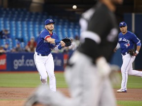 Blue Jays third baseman Josh Donaldson makes a throw to first on Tuesday against the White Sox. (GETTY IMAGES)