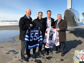 Humboldt Broncos vice-president Randy MacLean, Winnipeg Jets chairman Mark Chipman, Chicago Blackhawks captain Jonathan Toews, Broncos president Kevin Garinger. (SUPPLIED PHOTO)