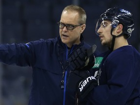 Jets head coach Paul Maurice and Predators counterpart Peter Laviolette have an interesting history. (KEVIN KING/Winnipeg Sun)