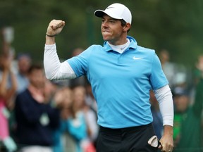 Rory McIlroy of Northern Ireland celebrates after making eagle on the eighth hole during the third round of the Masters Tournament on Saturday at Augusta National Golf Club in Augusta, Ga.