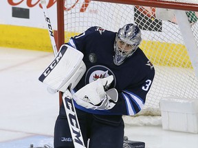 Jets goalie Connor Hellebuyck tied for the league lead in wins (44) with Tampa’s Andrei Vasilevskiy and had the fewest losses in the NHL — just 11 outright losses in 64 starts.