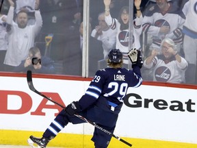 WINNIPEG, MANITOBA - APRIL 11: Patrik Laine #29 of the Winnipeg Jets celebrates his goal against the Minnesota Wild in Game One of the Western Conference First Round during the 2018 NHL Stanley Cup Playoffs on April 11, 2018 at Bell MTS Place in Winnipeg, Manitoba, Canada. (Photo by Jason Halstead /Getty Images)