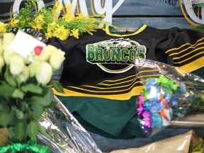 An ice hockey jersey is left in a makeshift memorial at the Humboldt Uniplex in Humboldt, earlier this month.