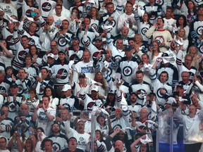 Jets fans get into the spirit of things during Game 1 of Winnipeg's first-round playoff series against the Minnesota Wild on Wednesday night. (Kevin King/Winnipeg Sun)