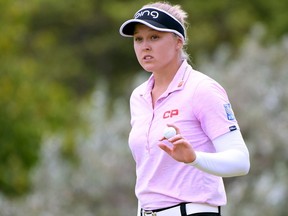 Brooke Henderson of Canada reacts to her putt for par on the ninth green during the second round of the LPGA LOTTE Championship at the Ko Olina Golf Club on April 12, 2018