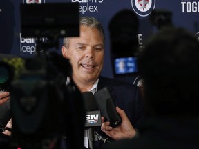 Winnipeg Jets GM Kevin Cheveldayoff talks to media on opening day of the Jets training camp in Winnipeg on September 14, 2017.