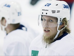 Winnipeg Jets right wing Patrik Laine (29) looks on during practice in Winnipeg on Monday, April 9, 2018, ahead of their opening playoff round against the Minnesota Wild. THE CANADIAN PRESS/John Woods ORG XMIT: JGW111