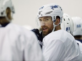 Winnipeg Jets right wing Blake Wheeler (26) talks with right wing Patrik Laine (29) during practice in Winnipeg on Monday, April 9, 2018, ahead of their opening playoff round against the Minnesota Wild. THE CANADIAN PRESS/John Woods ORG XMIT: JGW108