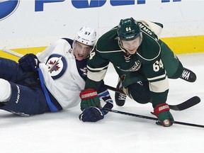 Jets' Tyler Myers (left) has played only 17 NHL playoff games but he's not worried about the edge in experience that the Mikael Granlund and the Minnesota Wild have.