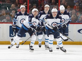 Andrew Copp of the Winnipeg Jets celebrates a goal against the Ottawa Senators on April 2, 2018