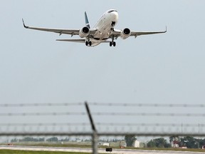 A 737 takes off from James Armstrong. Richardson International Airport in Winnipeg.