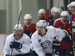 Mark Scheifele carries the puck during Jets practice at Bell MTS Iceplex in Winnipeg on Tuesday. (Kevin King/Winnipeg Sun)
