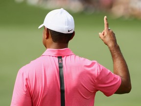 Tiger Woods gestures during a practice round prior to the start of the Masters at Augusta National Golf Club on April 2.