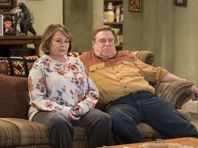 FILE - In this image released by ABC, Roseanne Barr, left, and John Goodman appear in a scene from the reboot of "Roseanne," premiering on Tuesday at 8 p.m. EST. For the reboot, Roseanne will be at odds with her sister Jackie, played by Laurie Metcalf, over President Donald Trump. Barr said she thought it was important to show how the Conner family deals with the same issues many American families are facing.
