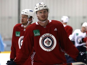 Jets defenceman Jacob Trouba reacts during Winnipeg Jets practice at Bell MTS Iceplex.