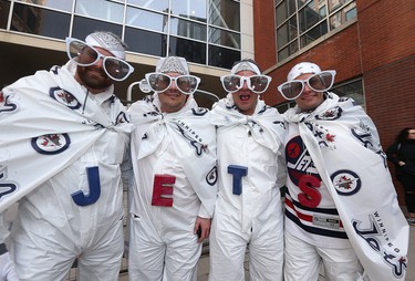 Fans still sober enough to spell at the Winnipeg Whiteout Street Party on Donald Street on Wed., April 11, 2018. Kevin King/Winnipeg Sun/Postmedia Network