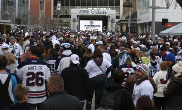 People crowd Donald Street for the Winnipeg Whiteout Street Party on Wed., April 11, 2018. Kevin King/Winnipeg Sun/Postmedia Network