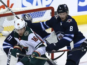 Winnipeg Jets defenceman Jacob Trouba (right) is a pending restricted free agent.