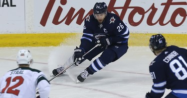 Winnipeg Jets forward Blake Wheeler hits the brakes in the Minnesota Wild end during Game 1 of their first-round NHL playoff series in Winnipeg on Wed., April 11, 2018. Kevin King/Winnipeg Sun/Postmedia Network