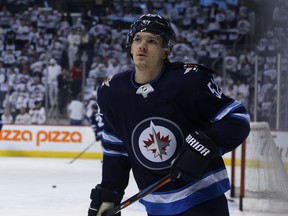 Jets forward Jack Roslovic took injured Mathiew Perreault’s spot in the lineup Friday night. 
 Kevin King/Winnipeg Sun/Postmedia Network