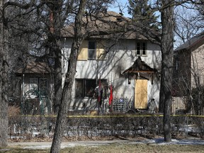 A house on Wellington Crescent South in Winnipeg, from which one person was taken to hospital following a fire on Saturday.