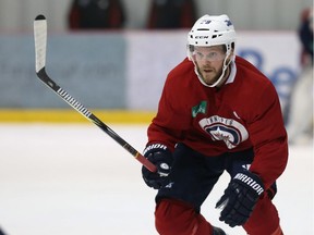 Toby Enstrom skates during Winnipeg Jets practice at Bell MTS Iceplex on Tuesday.