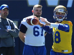 Quarterbacks Alex Ross throws during Winnipeg Blue Bombers mini-camp at Investors Group Field on Tuesday.
