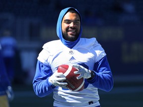 Wide receiver Nic Demski holds a ball during Winnipeg Blue Bombers mini-camp at Investors Group Field in Winnipeg on Tues., April 24, 2018. Kevin King/Winnipeg Sun/Postmedia Network